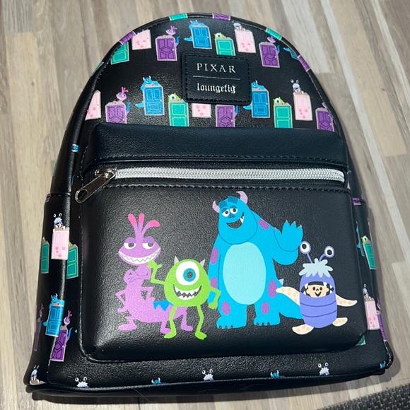 Loungefly Bags Loungefly Disney Pixar Monsters Inc Doors Mini
